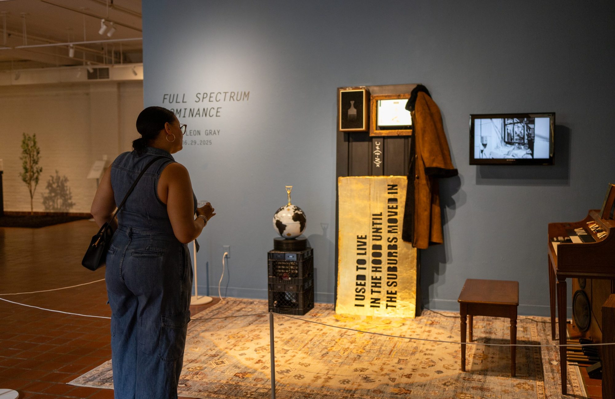 A photo of André Leon Gray's show "Full Spectrum Dominance" at a May First Friday event at Artspace. Credit Sanjé James/Artspace.