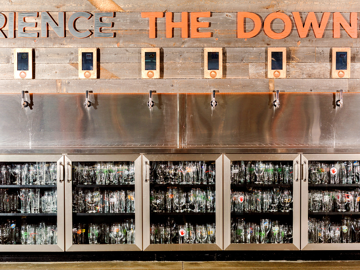 The wall of pour your own craft beers, regulated by a RFID bracelet, at Clouds Brewing in 2015. Photo by Jeremy M. Lange.